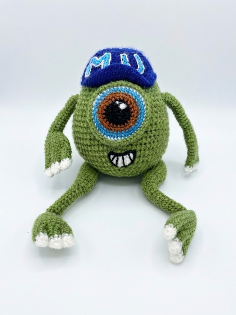 Handmade crochet Green One-Eyed Monster Plush Toy with Blue Cap
